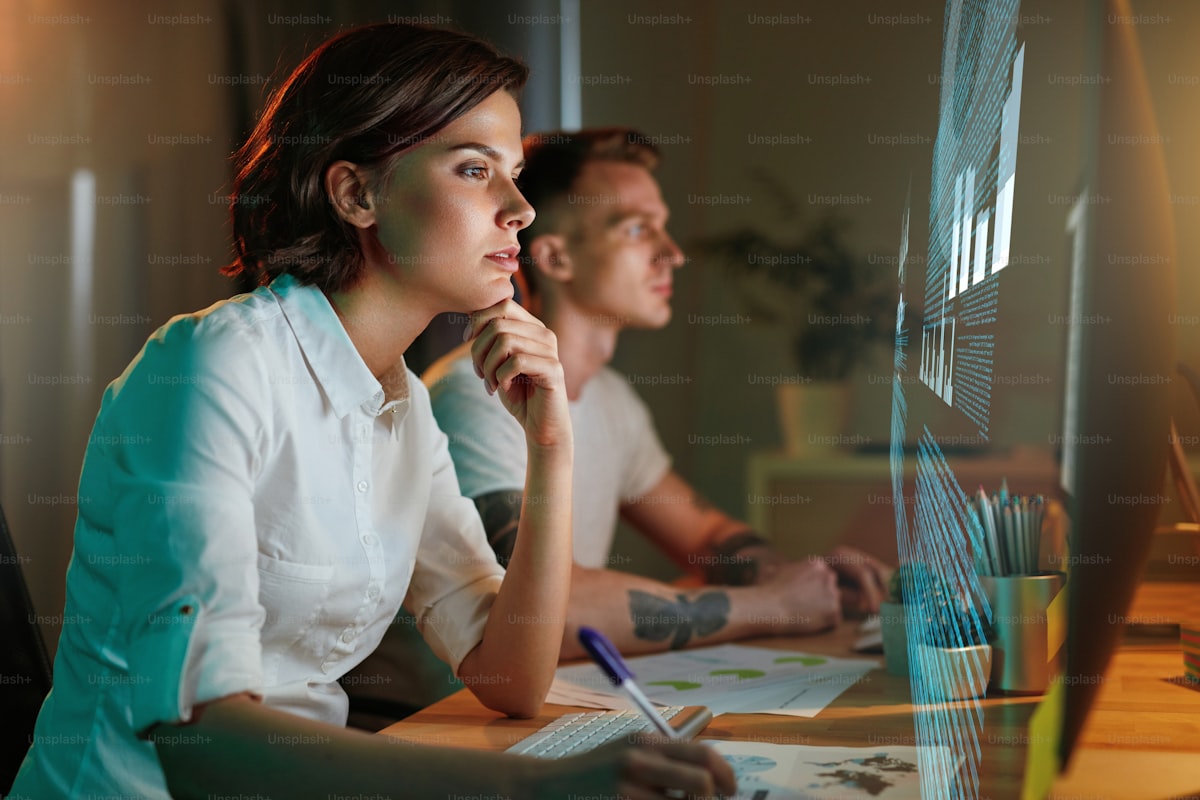 Engineering and operations specialists reviewing automation workflows